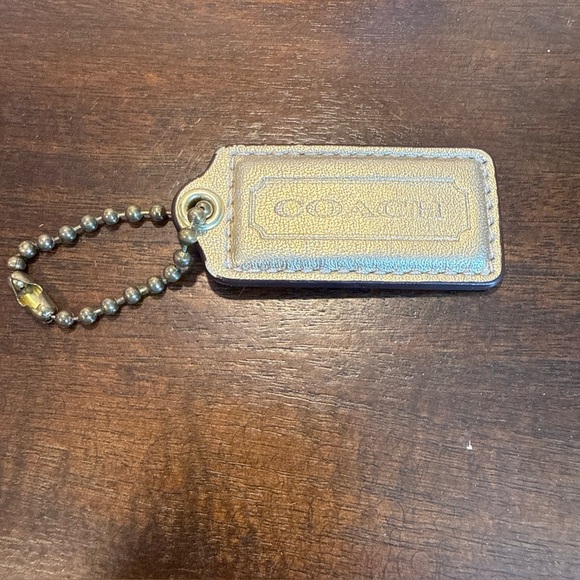COACH Hang Tag Gold Metallic Leather Key Fob Bag Charm 2” Keychain - Picture 1 of 5
